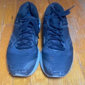Worn-in, Black Saucony Triumph 17 Sneakers